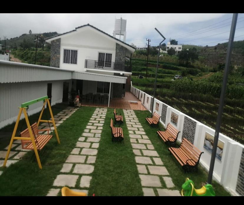 קודאיקנאל Rr Holiday Inn מראה חיצוני תמונה